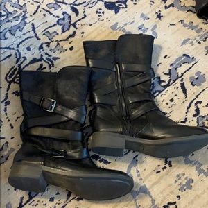 Black wrap around buckle boots, fur lined